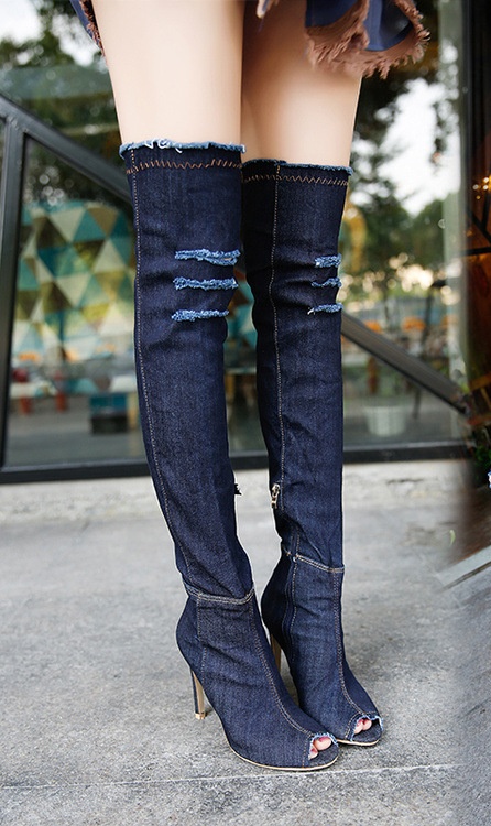 over the knee boots with ripped jeans