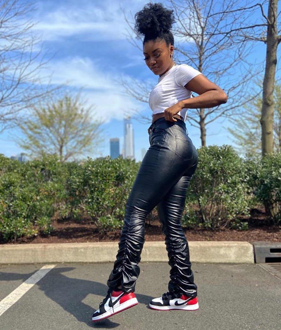 black stacked leather pants