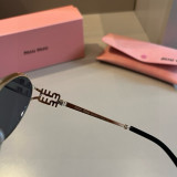 Sunglass miumiu