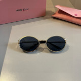 Sunglass miumiu