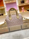 M2A039 Speedy Bandoulière 20 Handbag  This Speedy Bandoulière 20 handbag interprets the Monogram Emblème logo in elegant colors. Jacquard canvas constructs an embroidered, delicate texture, while a leather address tag and a lustrous padlock highlight classic details. Its compact design can hold essentials, and the cotton lining is adorned with the exclusive Louis Vuitton label.  20.5 x 13.5 x 12 cm  (Length x Height x Width)