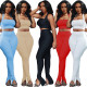 Two-piece Set Of Trousers With Split Halter Neck Straps