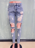 Blue Ripped Slim Fit Women's Denim Trousers