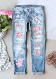 Mid-rise Straight-leg Jeans With Ripped Print Patches