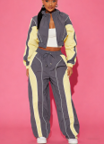 2025 Color-blocked Patchwork Fitted Top and Straight-leg Pants Two-piece Set with Zipper Closure