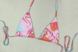 2026 Fashionable Vacation Travel Style Printed Asymmetrical Neck Top Bikini Skirt Three-Piece Set