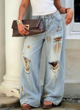 2026 New Light-Wash Distressed Jeans With Rips and Stained/Aged Details