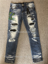 Amiri Stamped Leather Detailed Slim Jeans