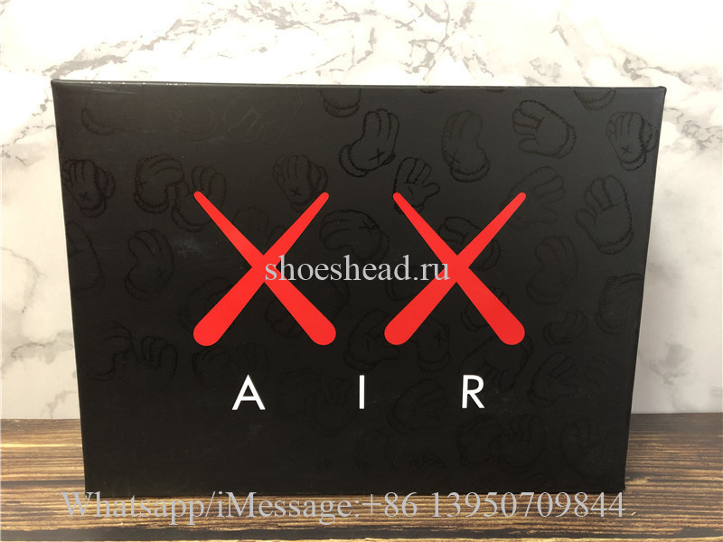 Kaws x Air Jordan 4 Retro Cool Grey