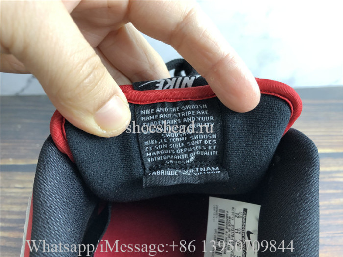 Supreme × Nike SB Dunk Low Red Cement