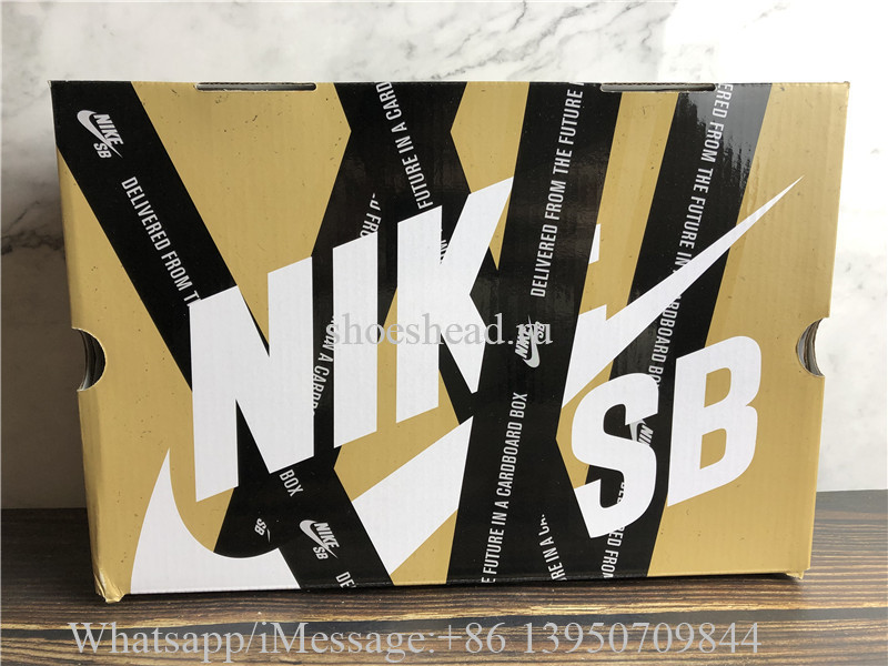 Supreme × Nike SB Dunk Low Red Cement
