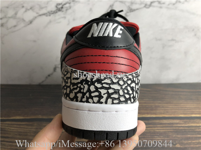 Supreme × Nike SB Dunk Low Red Cement