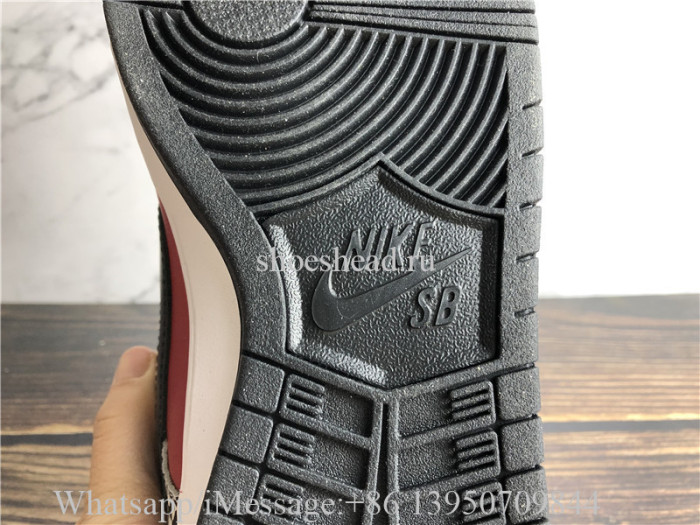 Supreme × Nike SB Dunk Low Red Cement