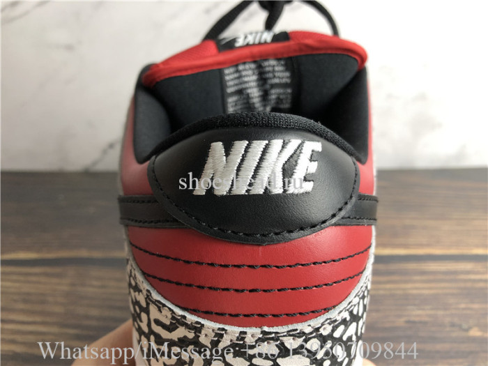 Supreme × Nike SB Dunk Low Red Cement