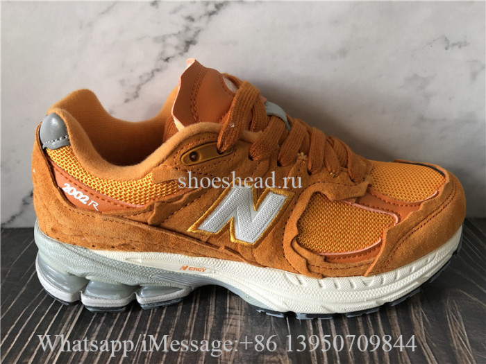 New Balance 2002R Protection Pack Vintage Facts Sneaker Orange