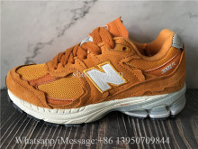 New Balance 2002R Protection Pack Vintage Facts Sneaker Orange