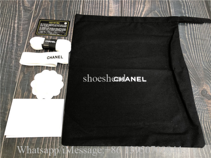 Chanel CC Embossed Logo Black White Suede Sneaker
