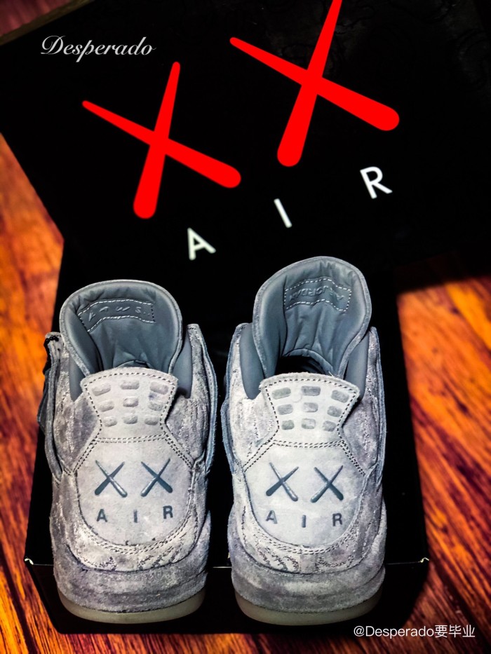 Kaws x Air Jordan 4 Retro “Cool Grey” 930155-003