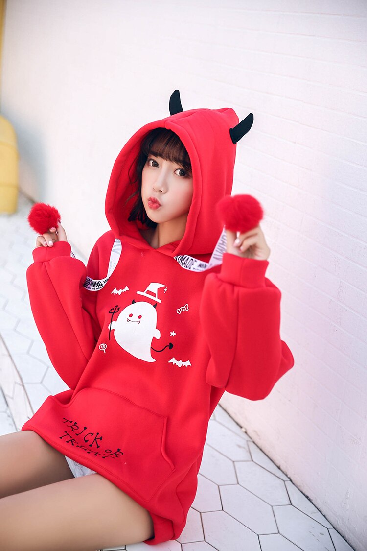 red hoodie with devil horns