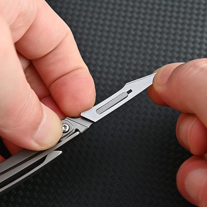 Small Titanium Utility Knife,EDC Pocket Knife Folding Knife with 10 Blades,Ultralight Keychain Knife only 0.32oz.(kpq-1031)