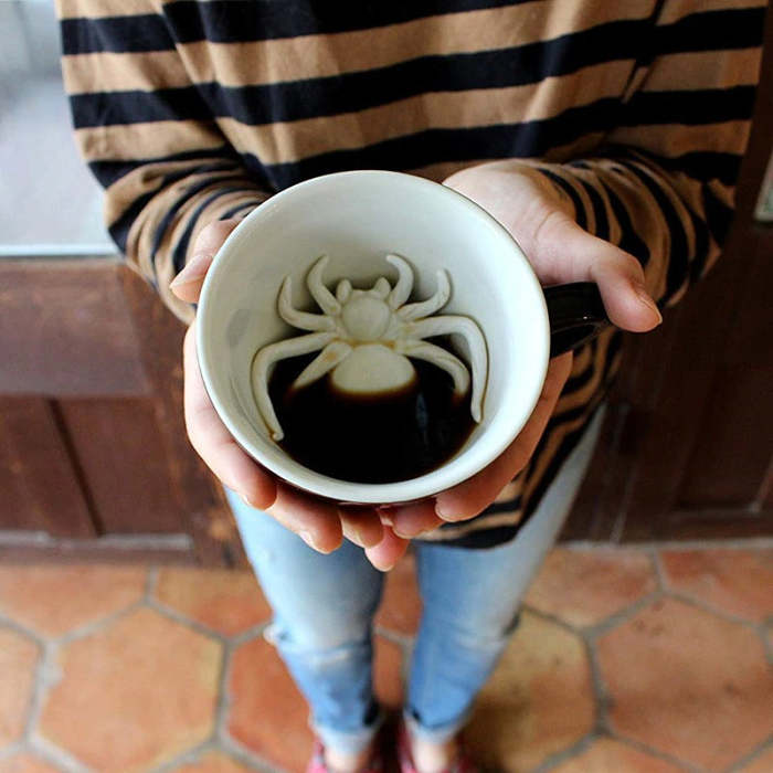 Scare the bugs out of someone with a mug that has a spider at the bottom