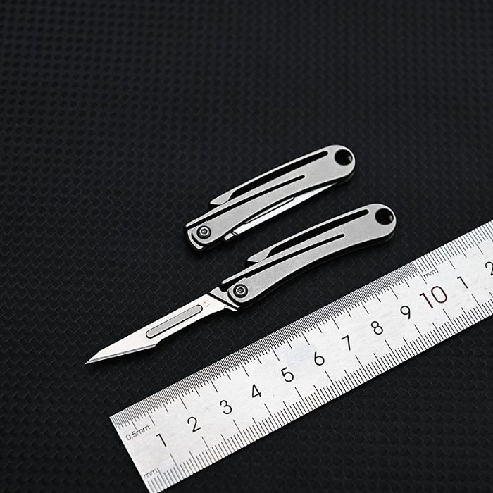 Small Titanium Utility Knife,EDC Pocket Knife Folding Knife with 10 Blades,Ultralight Keychain Knife only 0.32oz.(kpq-1031)