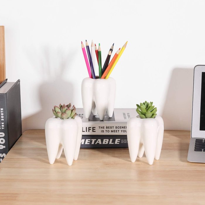 These teeth shaped planters will bring a smile to your dial