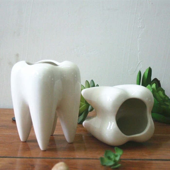 These teeth shaped planters will bring a smile to your dial