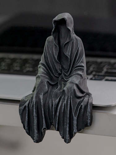 Mysterious Black Cloaked Figure Ornament