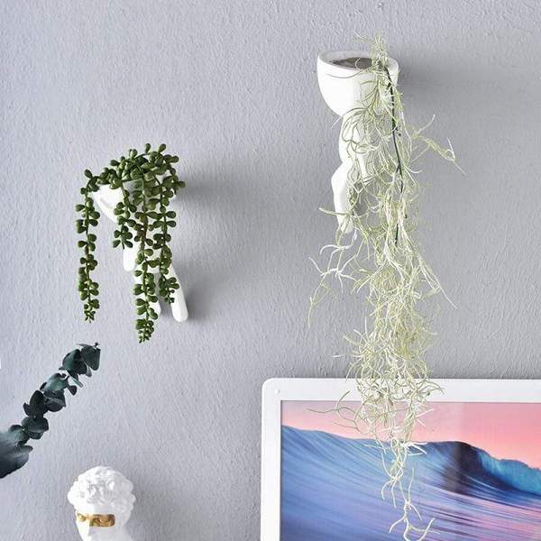 White Figurines Wall Pots