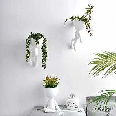 White Figurines Wall Pots