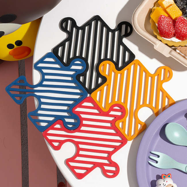 PuzzleMats Modular Jigsaw Insulation Pads by Veasoon