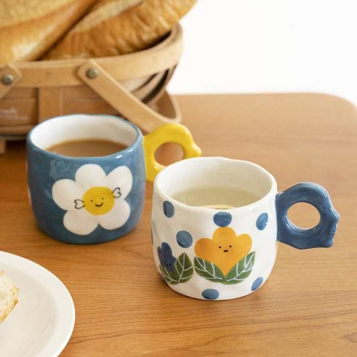 Smiley Flowers Ceramic Mug by Veasoon