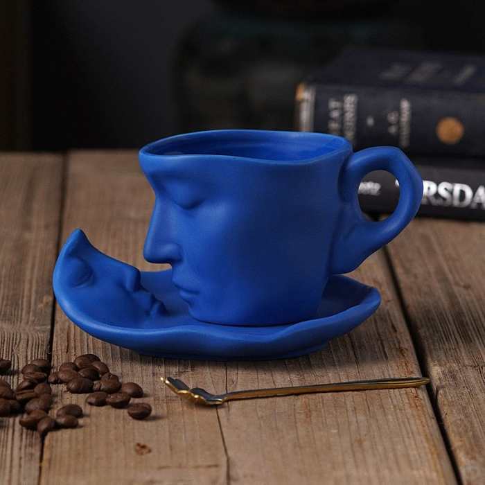 Face Reflection Coffee Cup and Saucer by Veasoon