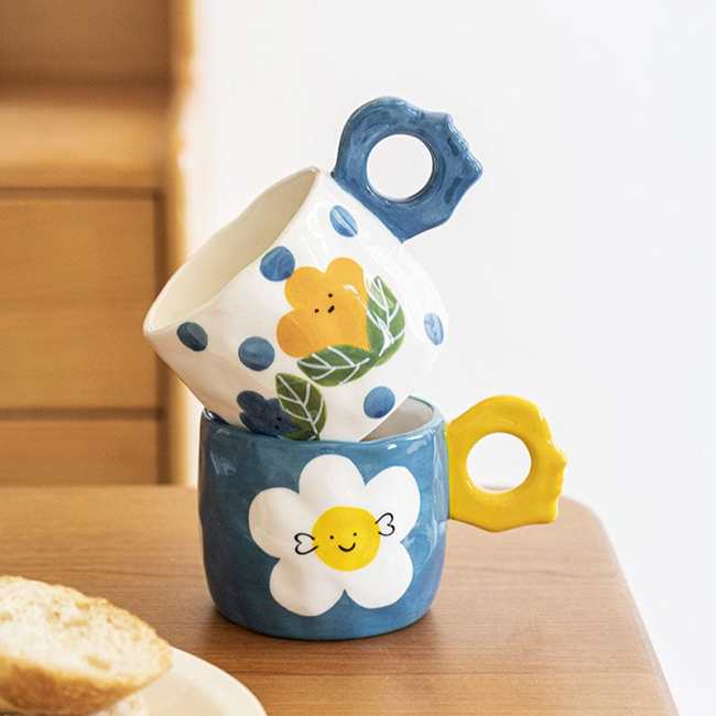 Smiley Flowers Ceramic Mug by Veasoon