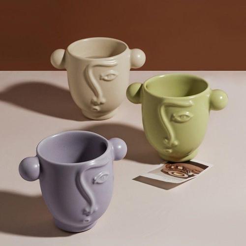 Abstract Face Ceramic Mugs (3 Colors) by Veasoon