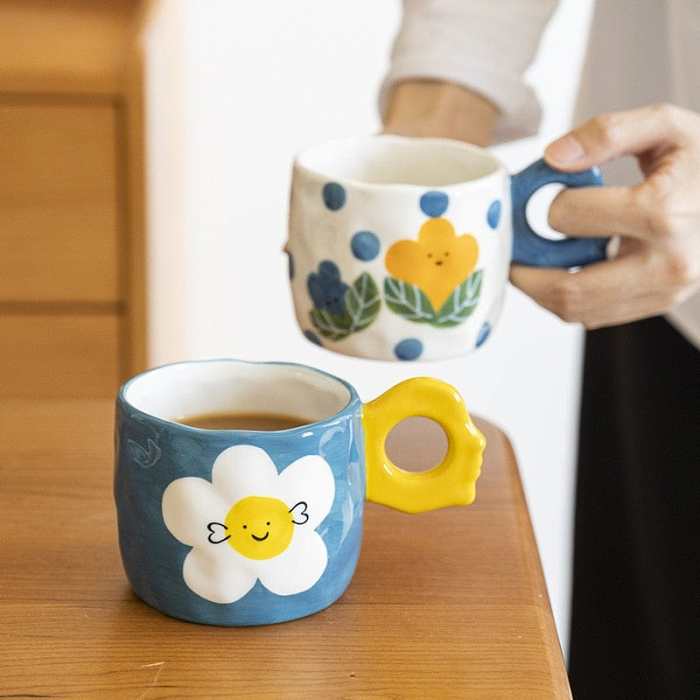 Smiley Flowers Ceramic Mug by Veasoon