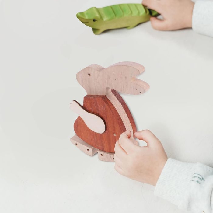 Wooden automatic walking toy on a slope