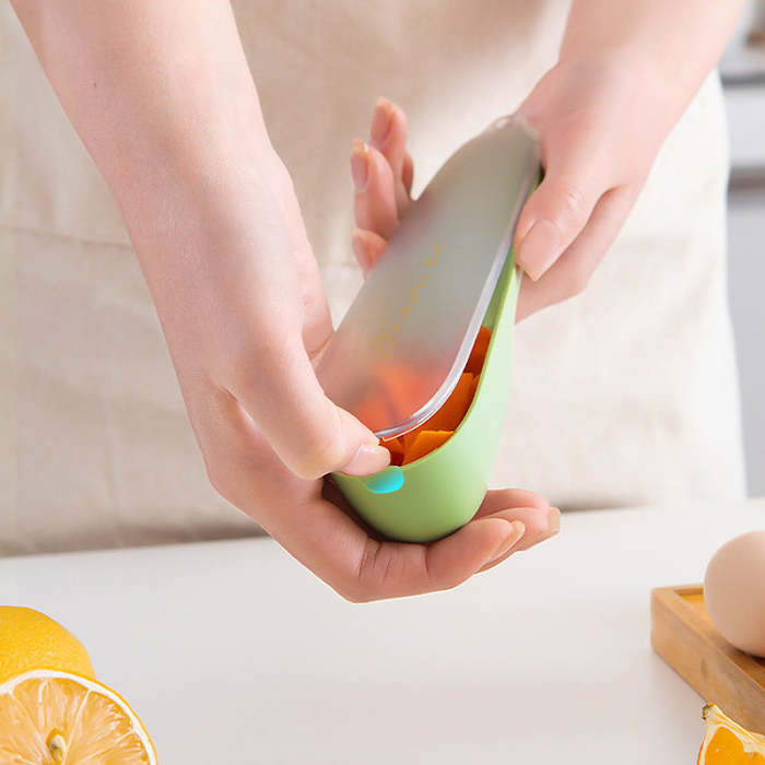 Peeler with Storage Tube