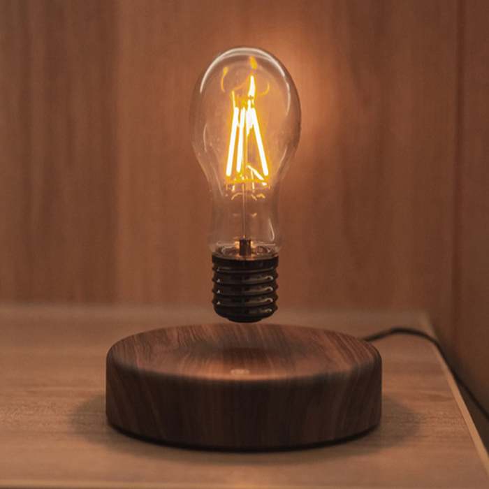 Magnetic Levitation Lamp Freely Floating and Spinning in the Air with Wooden Base and Light Bulb
