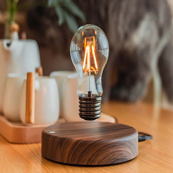 Magnetic Levitation Lamp Freely Floating and Spinning in the Air with Wooden Base and Light Bulb