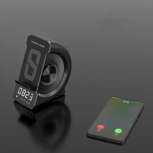 Portable Bluetooth speaker with wireless charging.