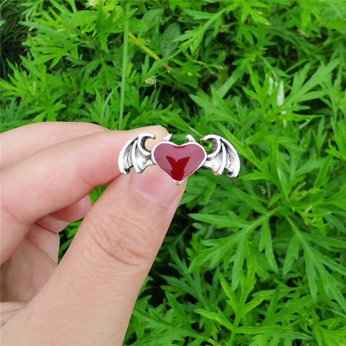 Gothic bat wing heart ring