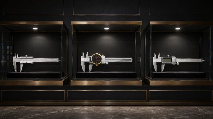 Vernier, dial and digital calipers displayed in luxury glass showcases