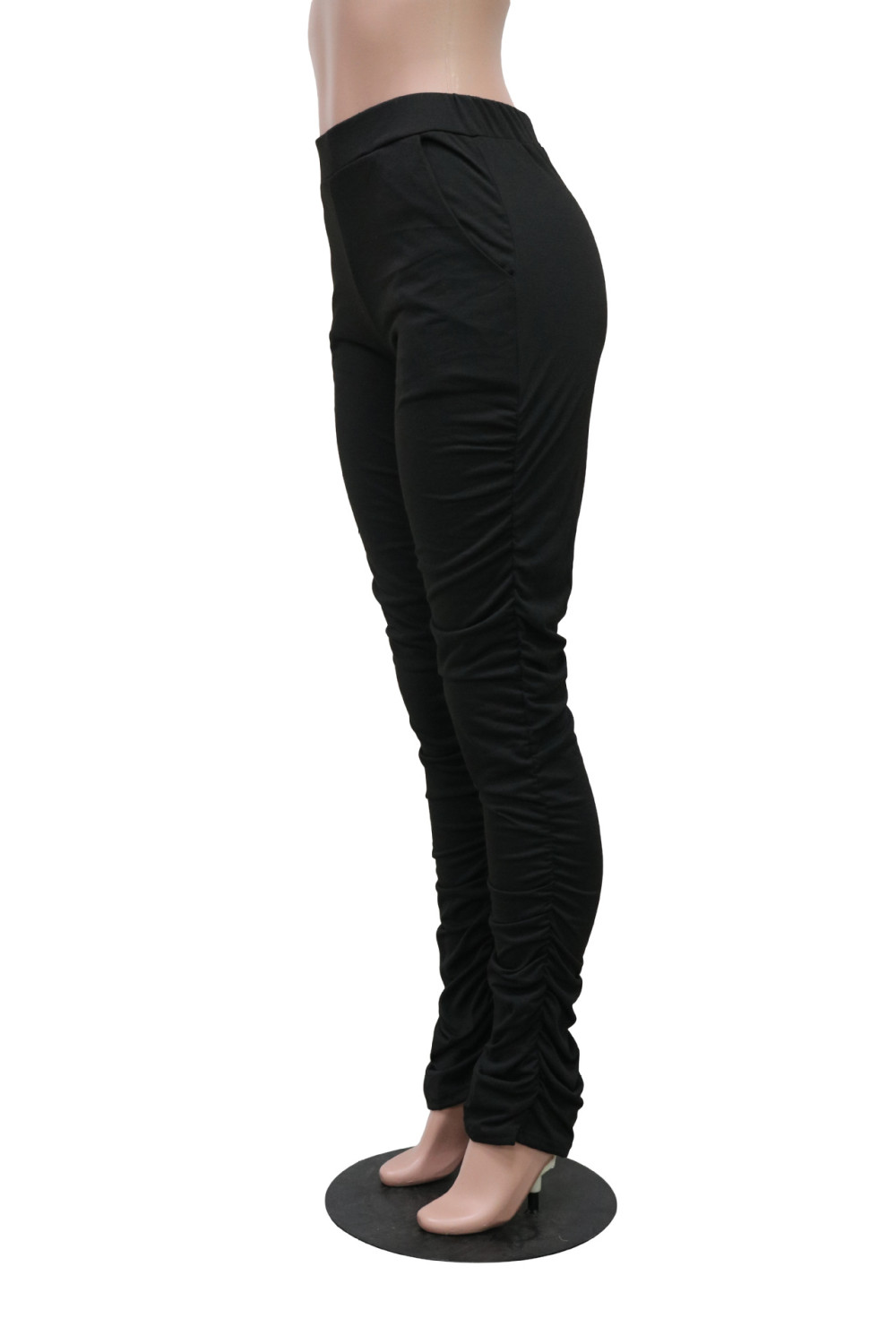 black stacked pants