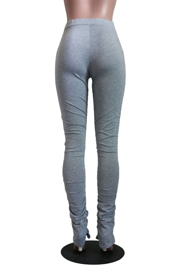 stacked grey pants