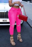 Tight Pink Jeans with Colorful Lace Up Back