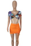Sexy O-Ring Print Crop Top and Orange Ruched Mini Skirt Set