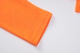 Trendy Orange Rib Chain Long Sleeve Crop Top