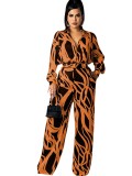 Orange and Black Print Button Up Long Sleeve Jumpsuit with Belt